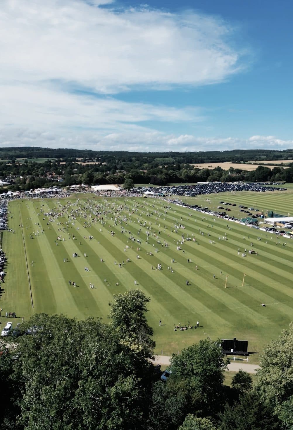 Aerial view of the polo grounds at Cowdray Park on match day
