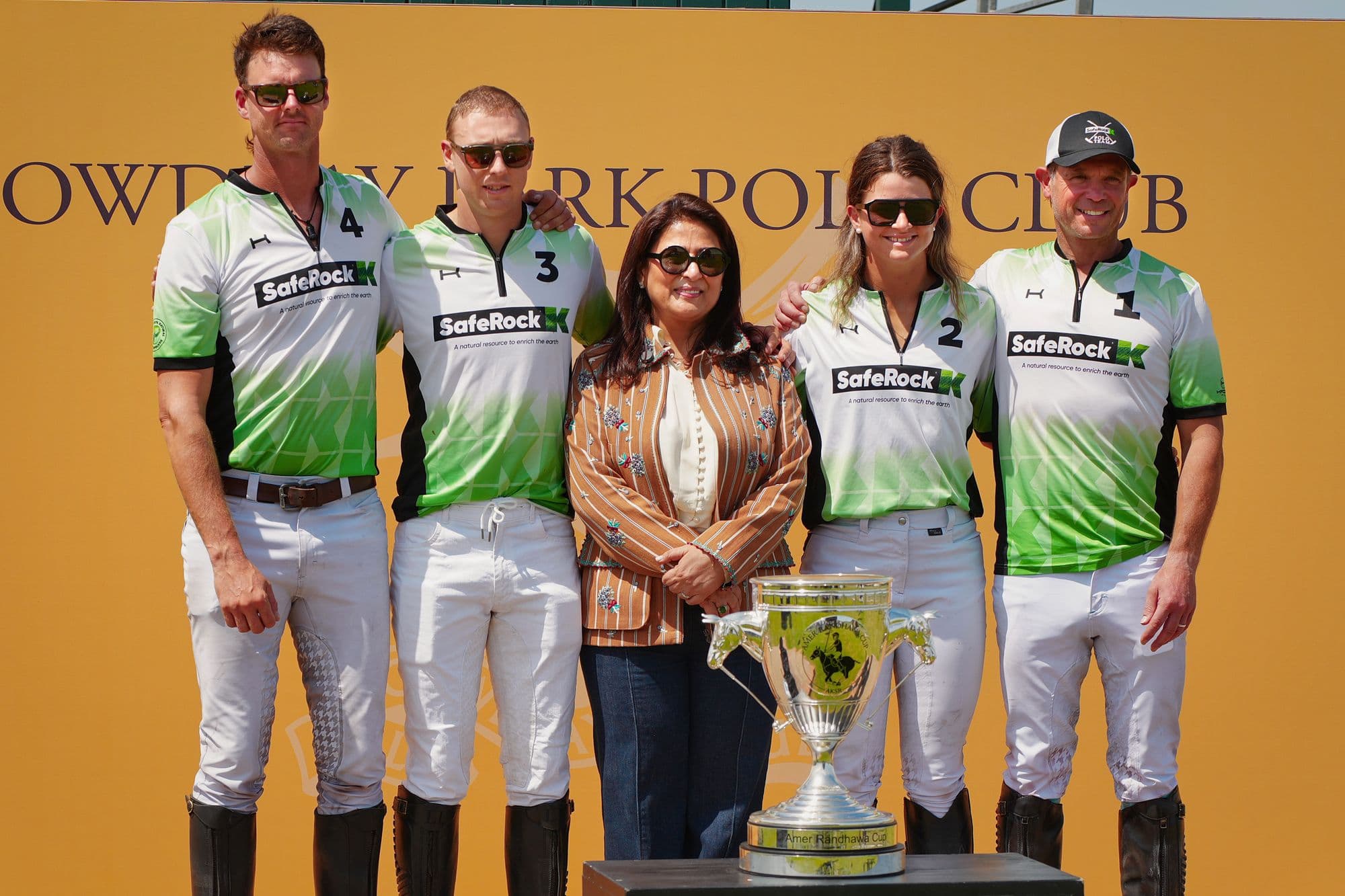 The SafeRock® Polo Team at a prize presentation, Cowdray Park Polo Club